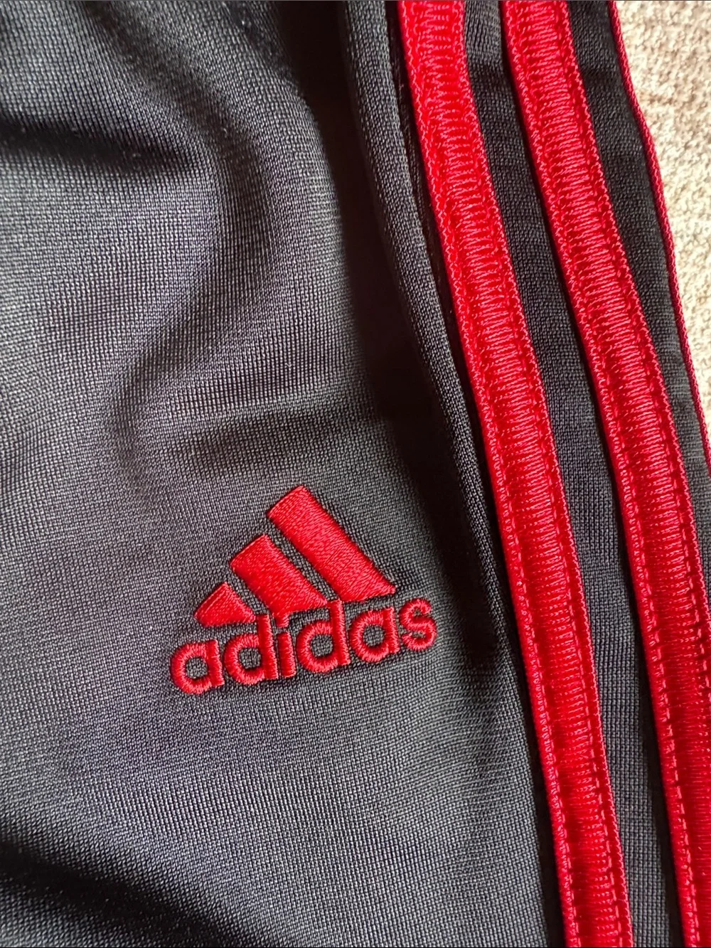 adidas Red Kids Tracksuit with Black Stripes and Accents size 18M